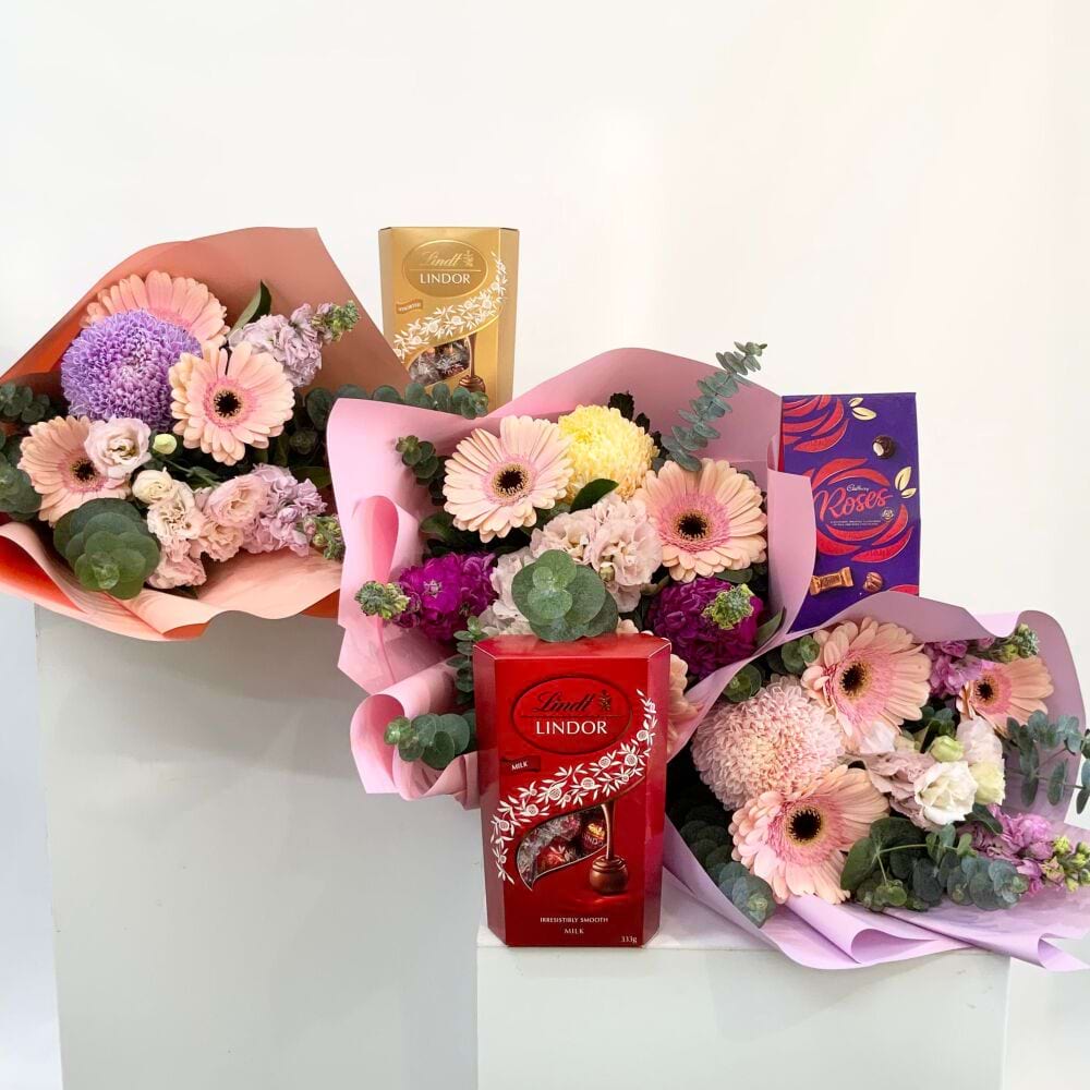 Posies of beautiful farm-fresh flowers paired with delicious boxes of chocolates. A perfect subscriber-only treat!