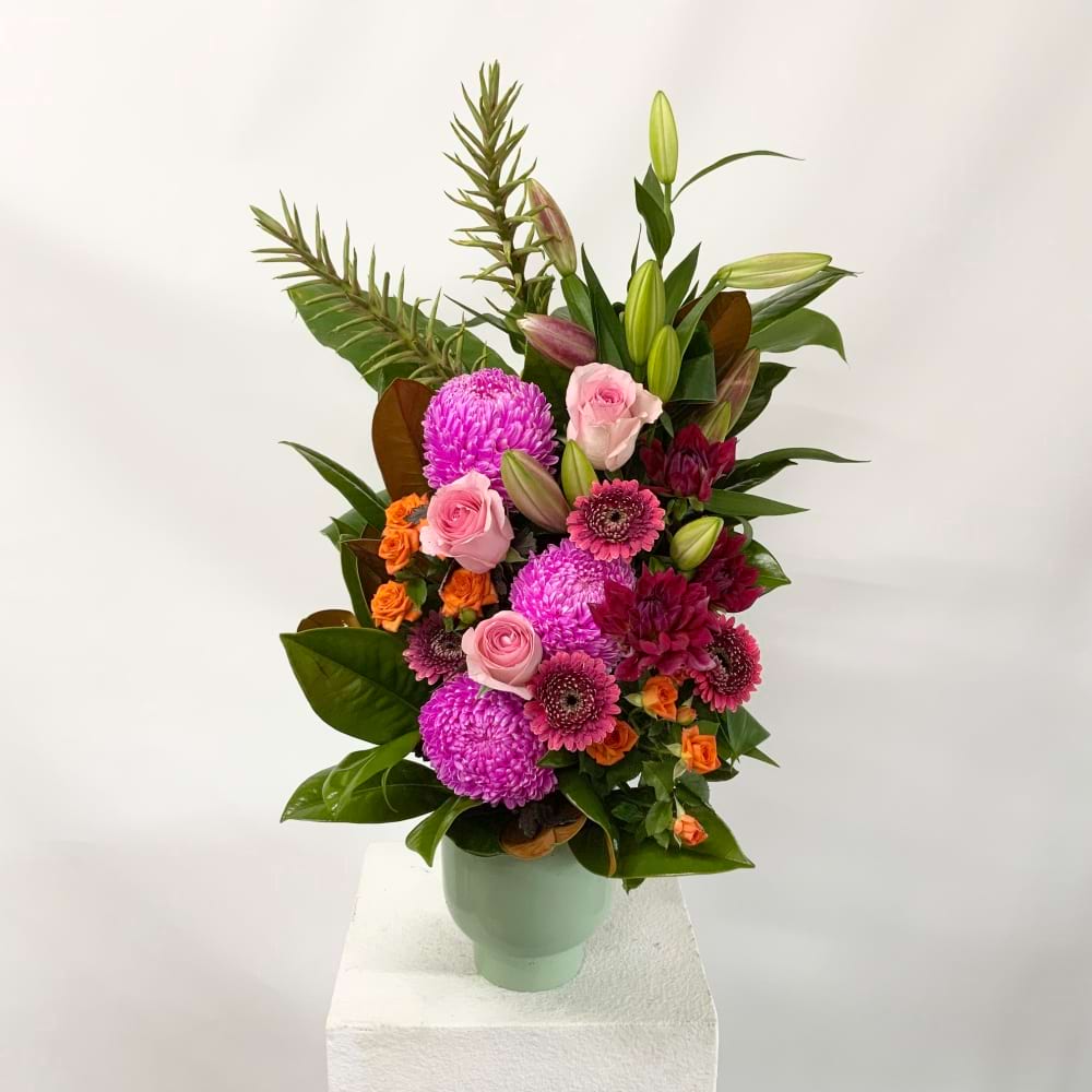 Florist Choice Arrangement Including Colour Roses